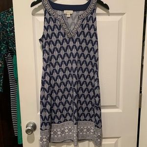 Navy blue dress with embroidered detail neck line